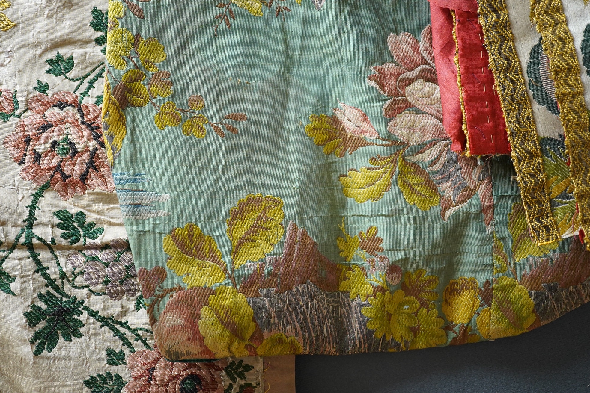 Samples of 18th century French, possibly Lyon silk, short loom brocades including two pairs and three single samples of varying sizes, one pair multi polychrome of large exotic flowers and fruits, the other pair pale blu